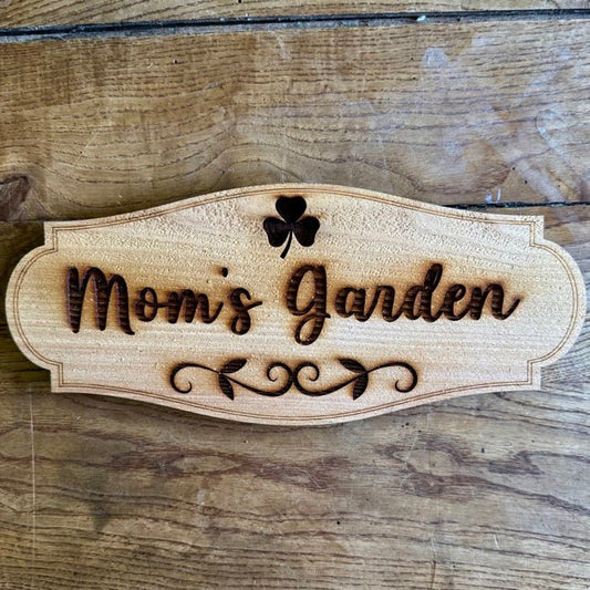 Mom's Garden Sign with Shamrock by The Celtic Farm, made in USA from American cedar, featuring a decorative shamrock design.