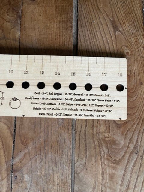 The Celtic Farm American Hardwood Seed and Bed Ruler, a sturdy wood gardening tool made in the US from American lumber.