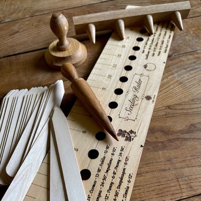 Garden gift set by The Celtic Farm including American hardwood seed and bed ruler, dibblers, pot tamper, and markers.