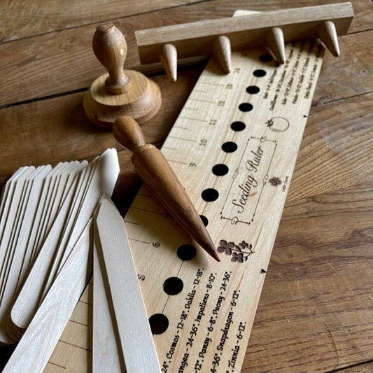 Garden gift set by The Celtic Farm including American hardwood seed and bed ruler, dibblers, pot tamper, and markers.