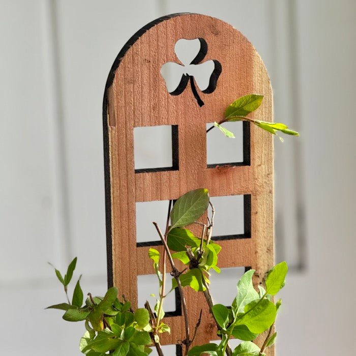 Unique Shamrock Trellis by The Celtic Farm, made in the USA from cedar and redwood, featuring a decorative shamrock design.