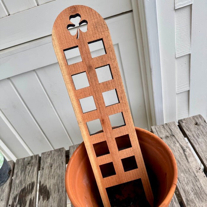 Unique Shamrock Trellis by The Celtic Farm, made in USA with durable cedar and redwood, featuring a decorative shamrock design.