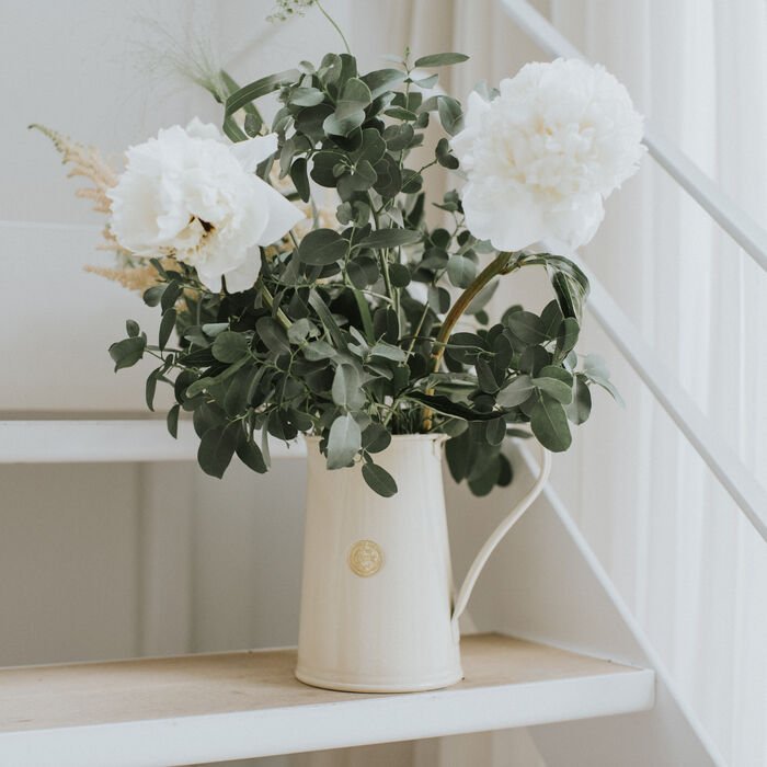 Cream-colored Haws watering pitcher from The Celtic Farm, designed for gentle watering of plants and garden flowers.