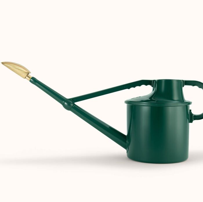 Dark green Haws Cradley Deluxe watering can by The Celtic Farm, with a long spout and ergonomic handle for easy watering.
