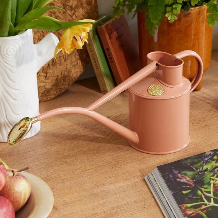 Dark green Haws Rowley Ripple watering can by The Celtic Farm, with a textured handle and spout for easy watering.