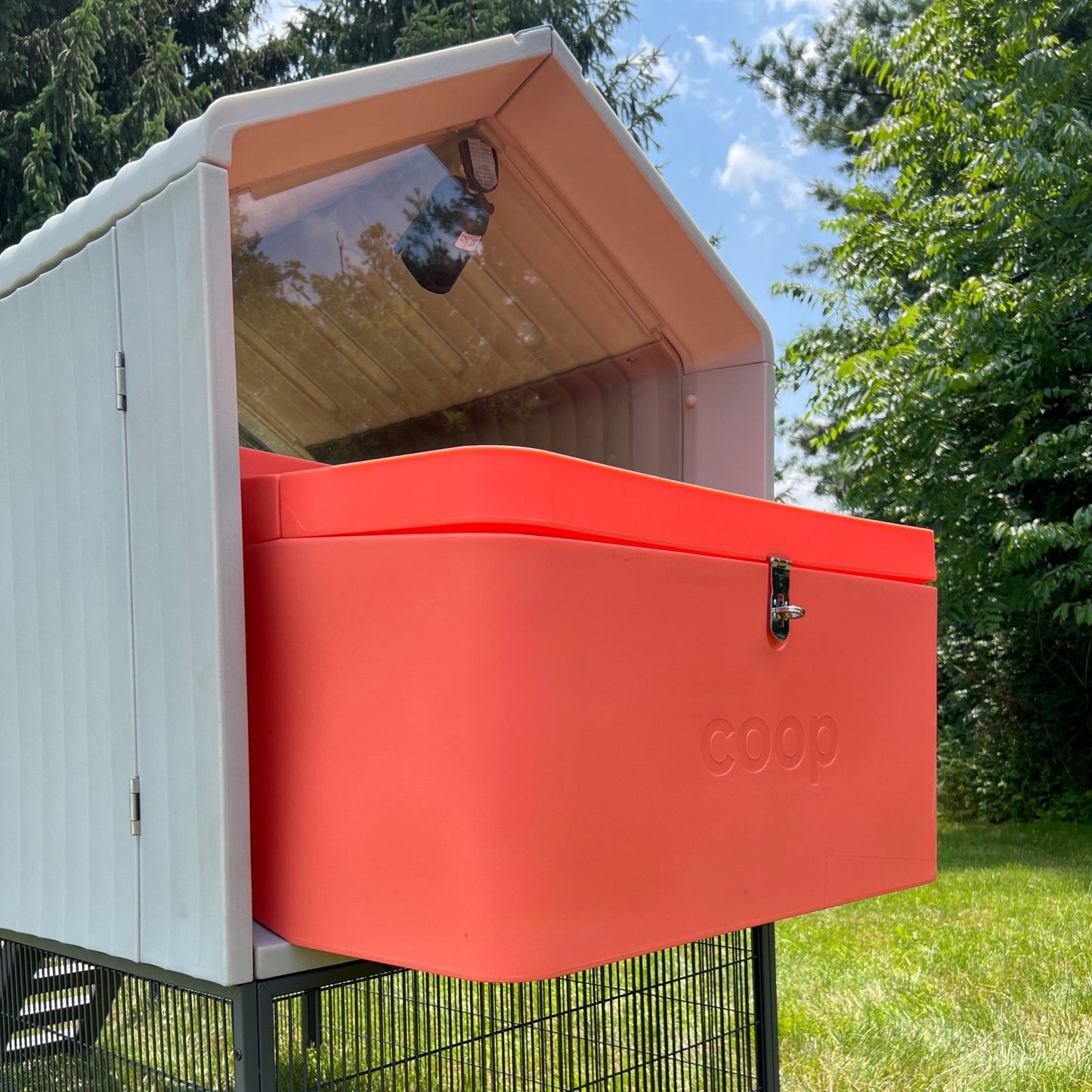 The Smart Coop chicken coop with spacious design and secure enclosure, suitable for raising chickens and protecting them from predators.