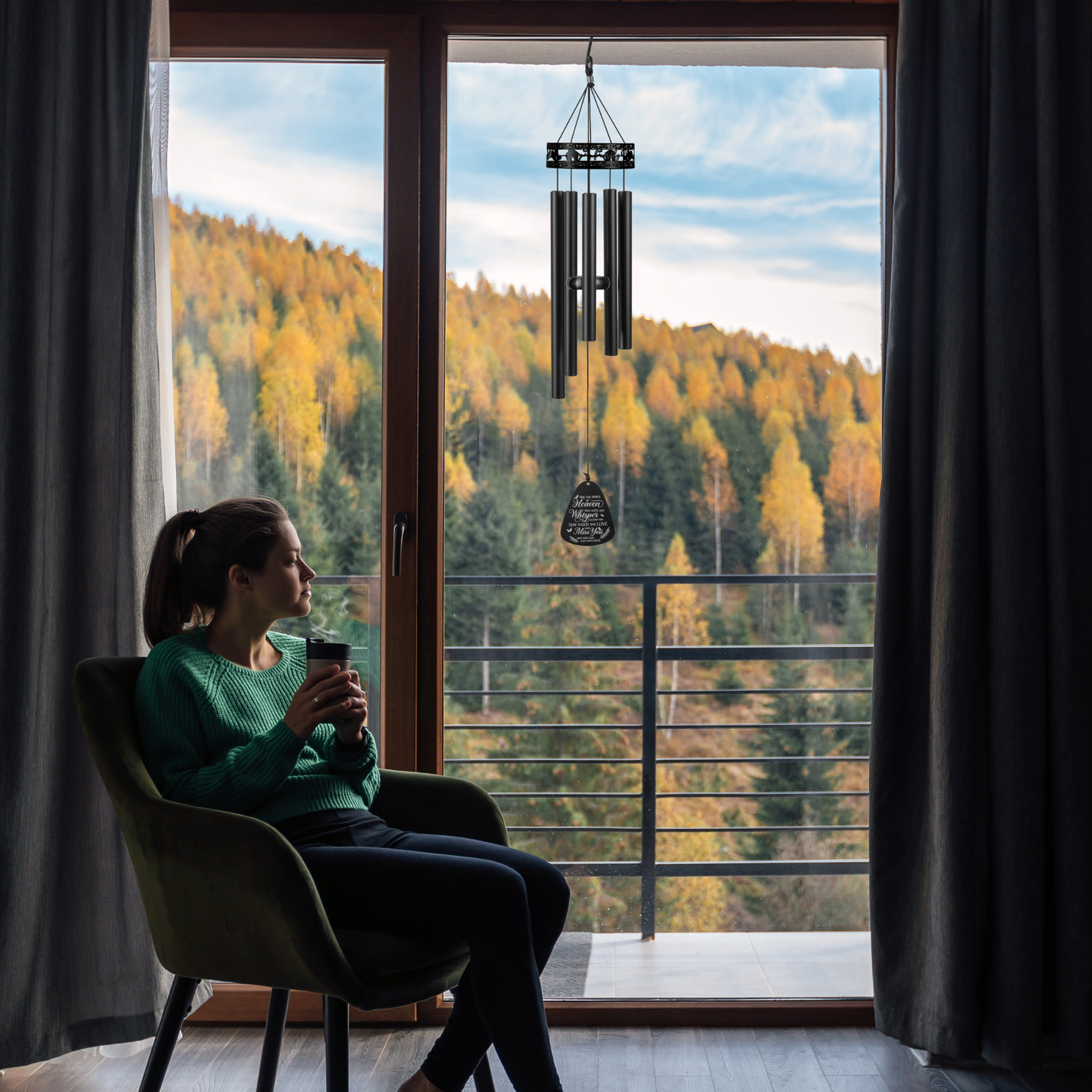 34-inch Serenity Family-Love Memorial Wind Chimes by The Wind Chime Co, hanging outdoors with gentle metal tubes for reflection.