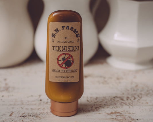 Sweet Harvest Farms Tick-No-Stick DEET-free tick repellent stick with natural ingredients, shown in the image.