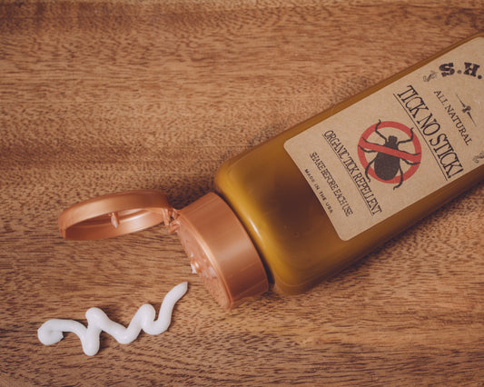 Tick-No-Stick DEET-free tick repellent stick by Sweet Harvest Farms, showing the portable, easy-to-use tick repellent product.