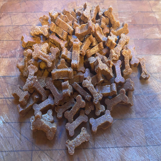 Organic peanut butter dog training treats from PAWsitively Organic Dog Bakery, small crunchy treats in a resealable bag.