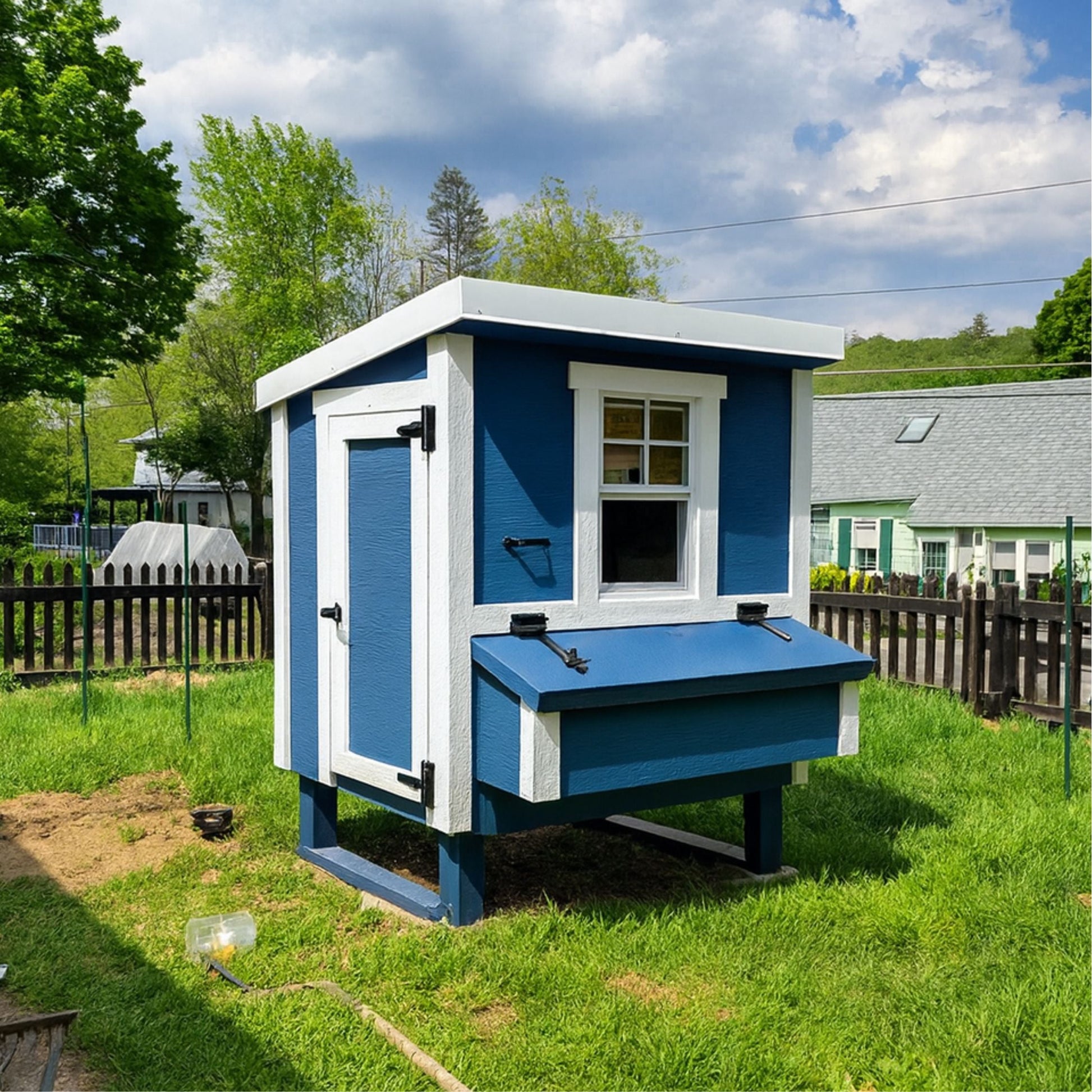 OverEZ Medium Chicken Coop designed for up to 10 chickens, featuring a sturdy wooden structure with ventilation and nesting areas.