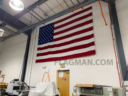 WallSafe™ polyester wall-mounted American flag with reinforced edge grommets, made in the USA by Flagman of America.