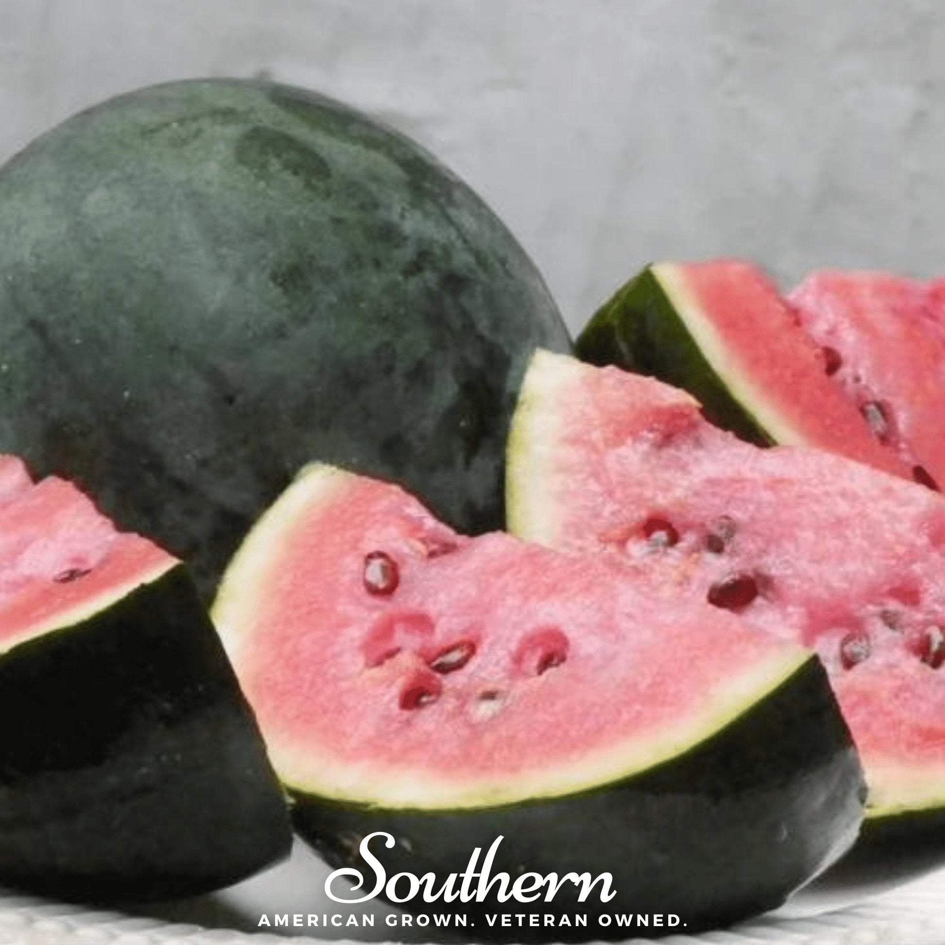 Sugar Baby Watermelon seeds by Southern Seeds, showing 25 seeds on a white background.