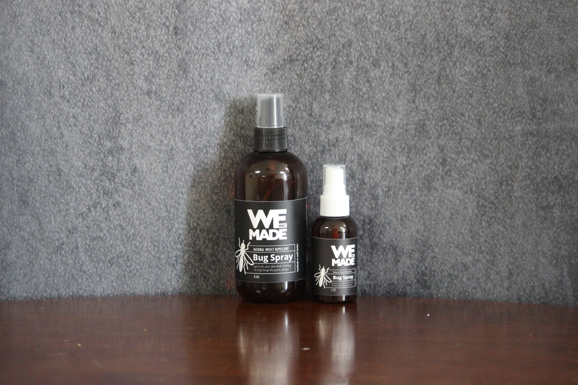 We Made 2 oz. bottle of bug spray with a spray nozzle, designed to repel insects effectively.