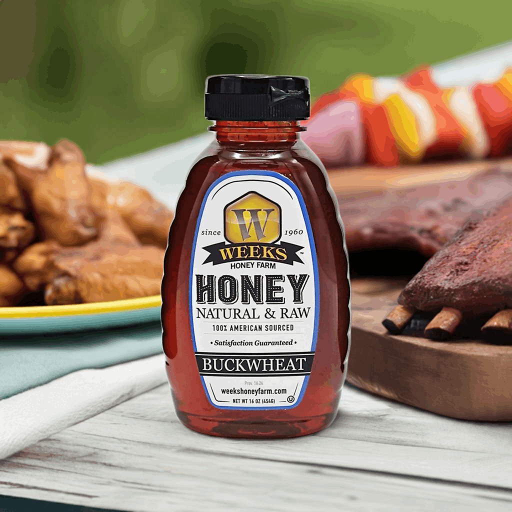 Weeks Raw Buckwheat Honey in a jar, showing dark, robust honey with molasses flavor ideal for coffee, waffles, and BBQ sauces.