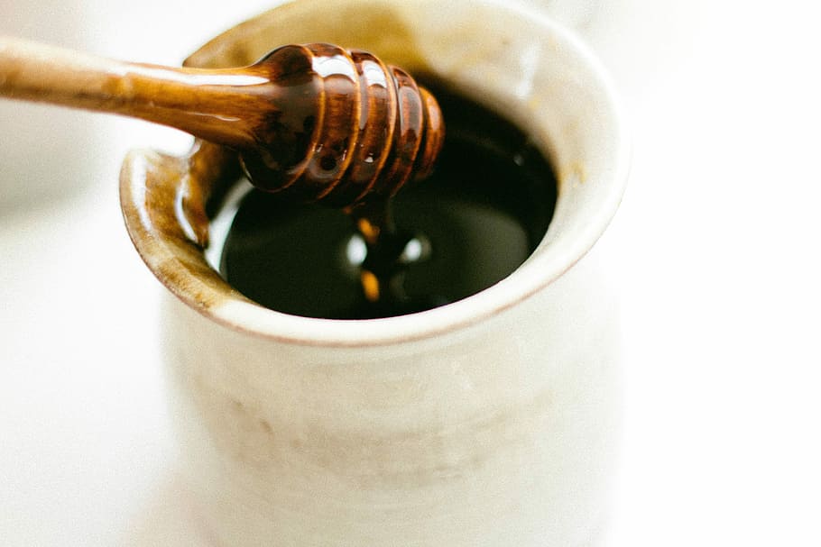 Weeks Raw Buckwheat Honey from Weeks Honey Farm, 12 oz, all-natural, antioxidant-rich honey with dark, robust molasses flavor for coffee and baking.