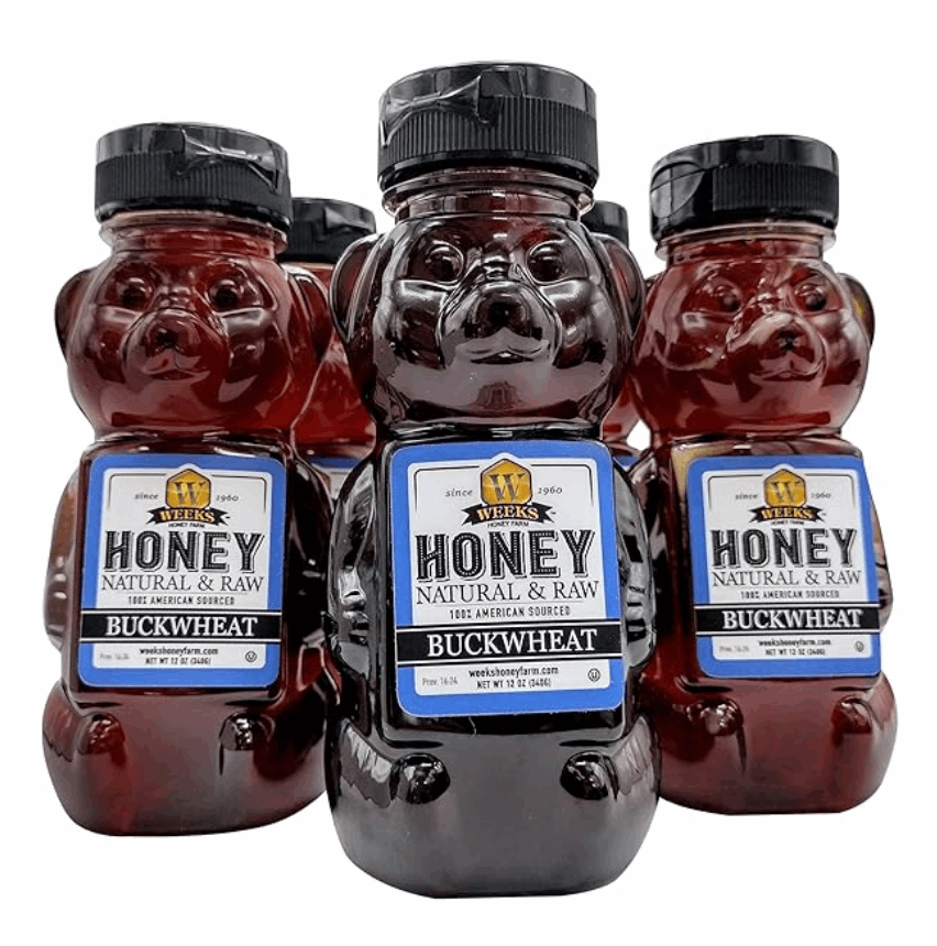 Weeks Raw Buckwheat Honey in a jar, showcasing dark, robust honey with a molasses flavor, ideal for coffee, waffles, and BBQ sauces.