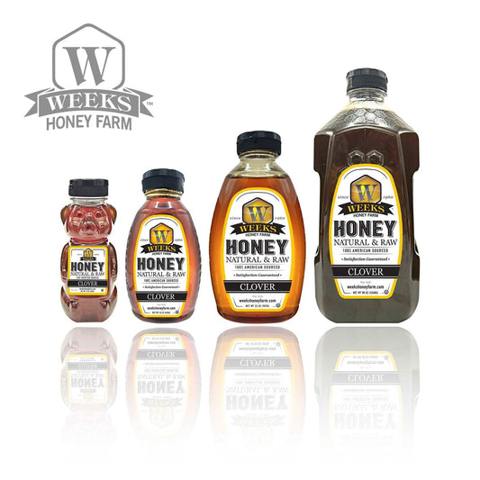 Glass jar of Weeks Naturals pure raw clover honey with a golden color, showcasing natural honey from Weeks Honey Farm.