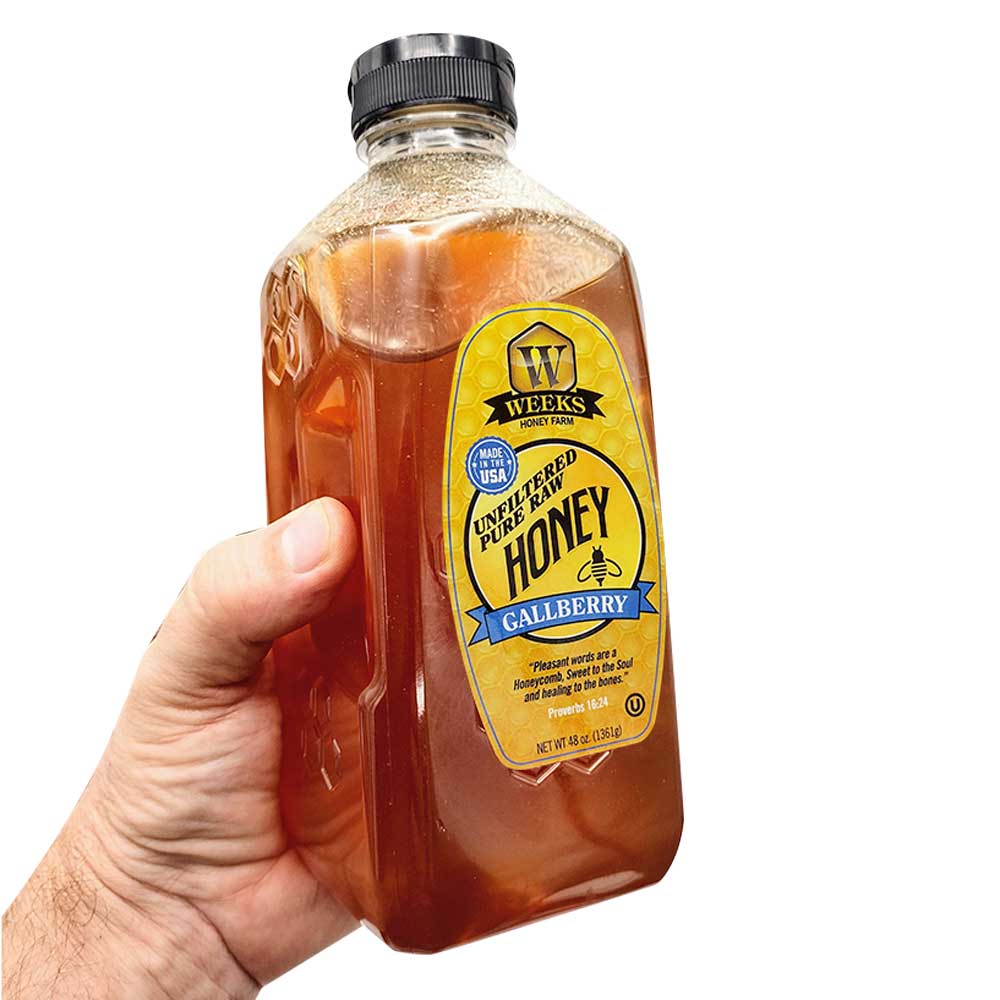 12-ounce jar of Weeks Naturals Gallberry Honey, raw and all-natural honey from Weeks Honey Farm, shown in a clear glass jar.