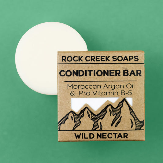 Wild Nectar conditioner bar by Rock Creek Soaps with argan oil, showcasing a colorful, eco-friendly hair conditioning product.