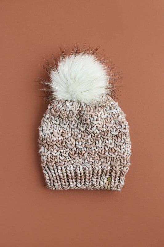 Pearl gray Merino Wool Knit Hat with faux fur pom pom from Woolly Bear Knits, featuring a cozy, stylish design.