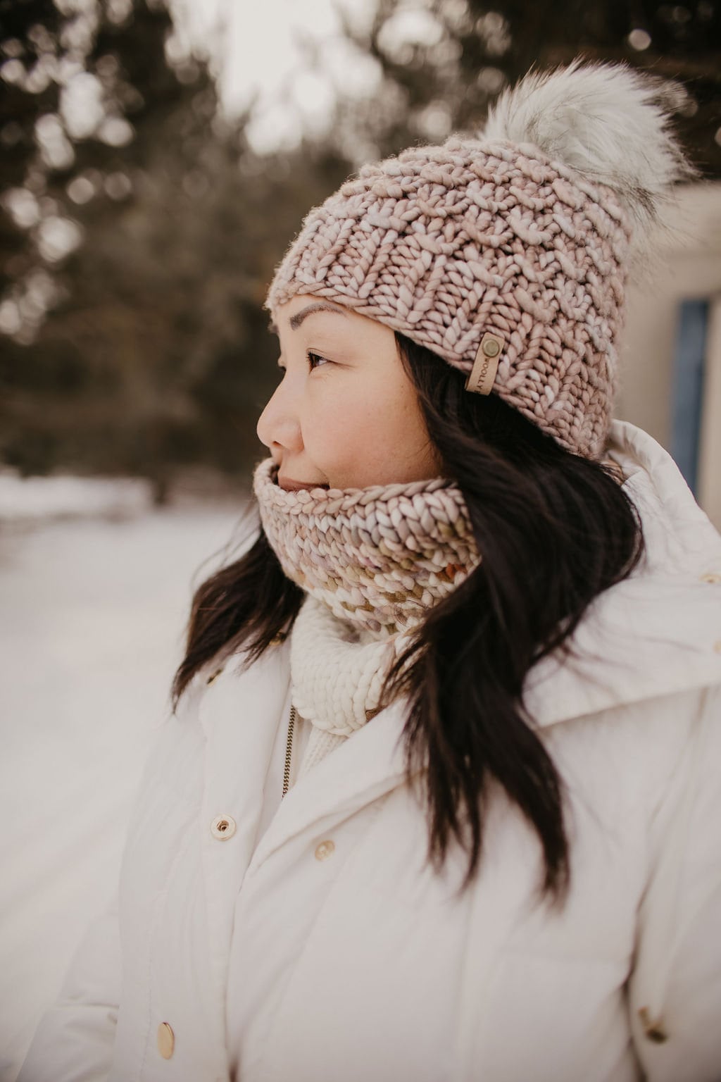 Pearl gray Merino Wool Knit Hat with faux fur pom pom by Woolly Bear Knits, featuring a cozy and stylish design.