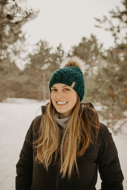 Forest green Peruvian wool knit hat by Woolly Bear Knits with faux fur pom pom, cozy and warm winter accessory.