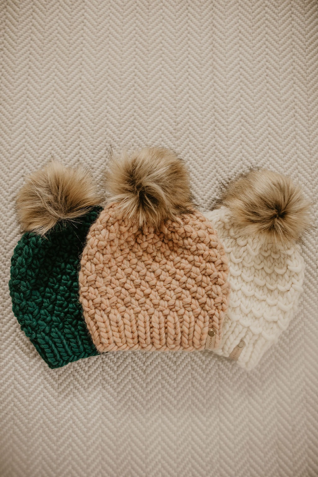 Ivory Peruvian Wool Knit Hat with faux fur pom pom by Woolly Bear Knits, featuring a cozy wool texture and fluffy pom on top.