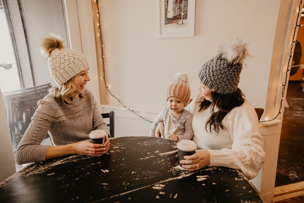 Ivory Peruvian wool knit hat with faux fur pom pom by Woolly Bear Knits, featuring a cozy, textured design and warm winter style.
