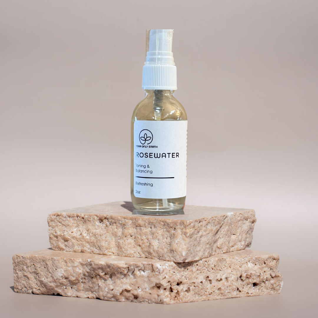 Simple bottle of Your Only Earth Rosewater with a clear label, showcasing the natural floral skincare product.