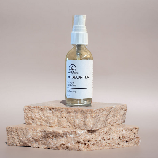 Simple bottle of Your Only Earth Rosewater with a clear label, showcasing the natural floral skincare product.