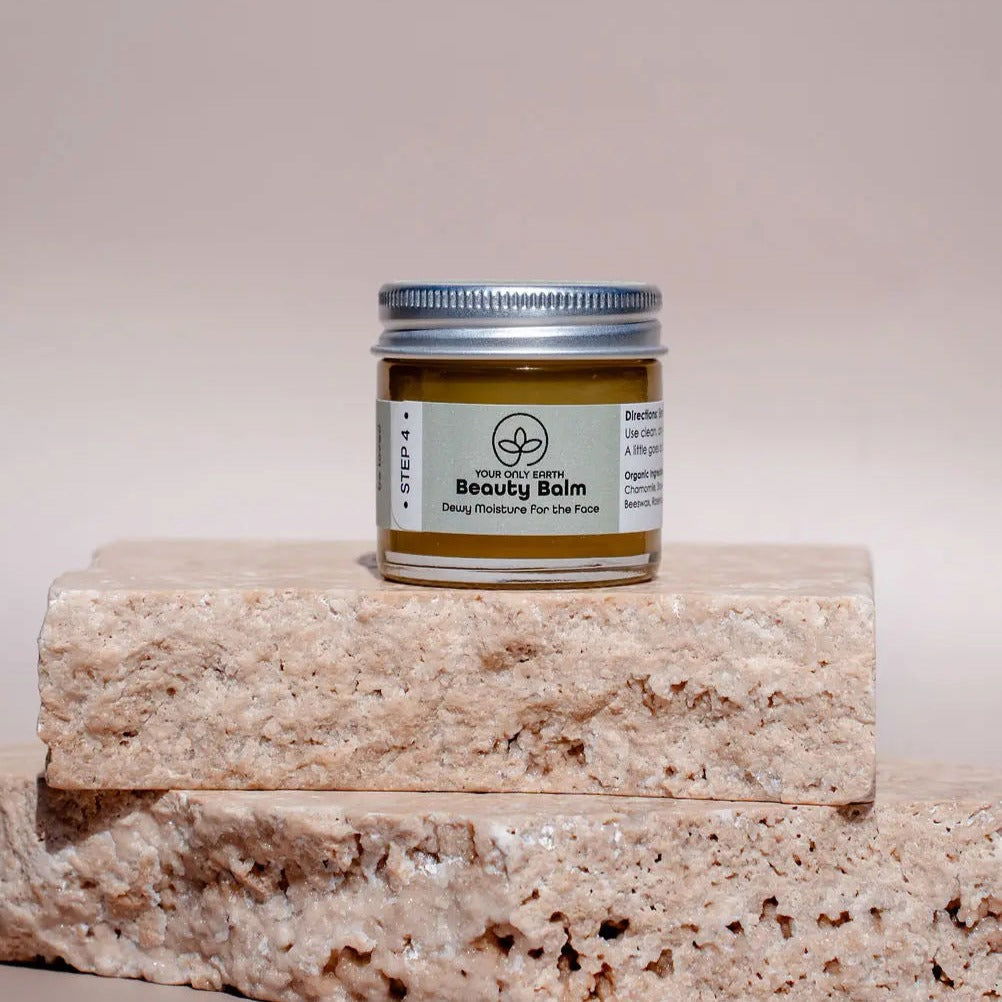 Your Only Earth Beauty Balm in a 1 oz jar, highlighting its smooth, creamy skin care formula perfect for nourishing skin.