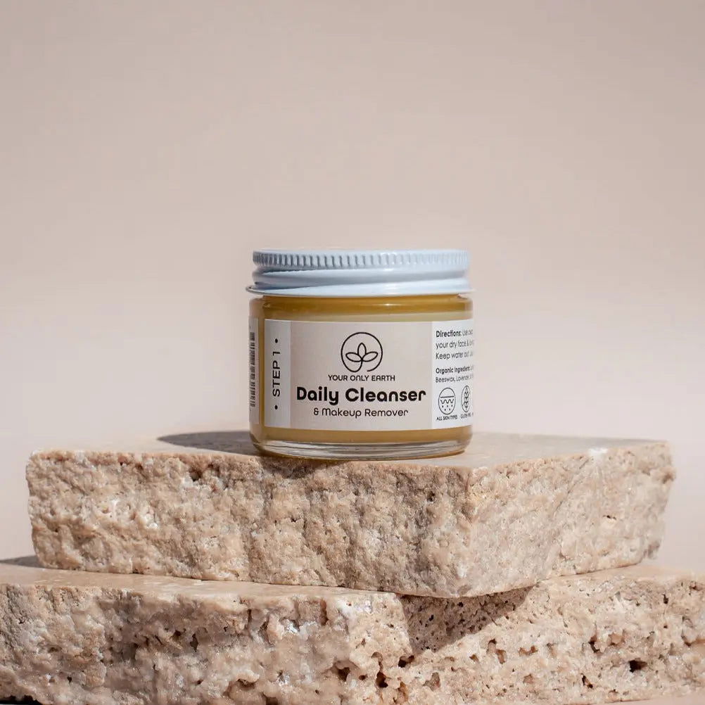 Your Only Earth daily cleanser and makeup remover in a 2 oz bottle, suitable for all skin types, gentle skincare product.