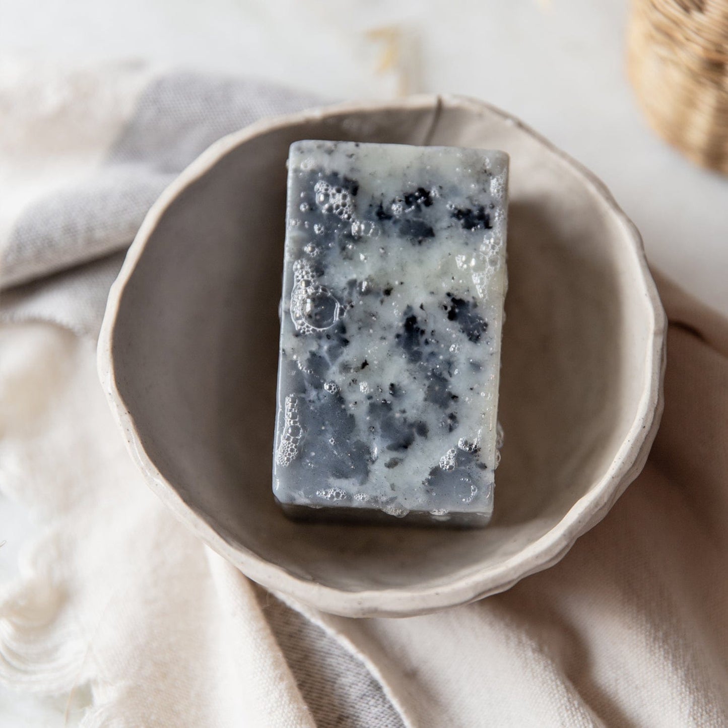 Turmeric soap bar by ZeroWasteStore.com, 4oz all-natural vegan face and body soap with six scent options, plastic-free packaging.