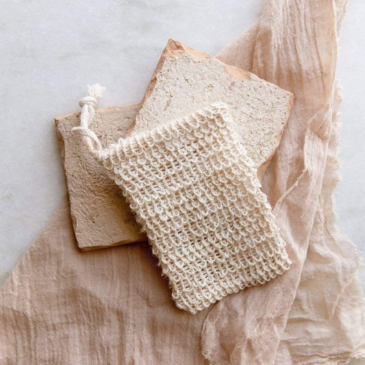 Natural fiber soap saver bag from ZeroWasteStore.com for bath and body, designed to hold soap and improve lather.