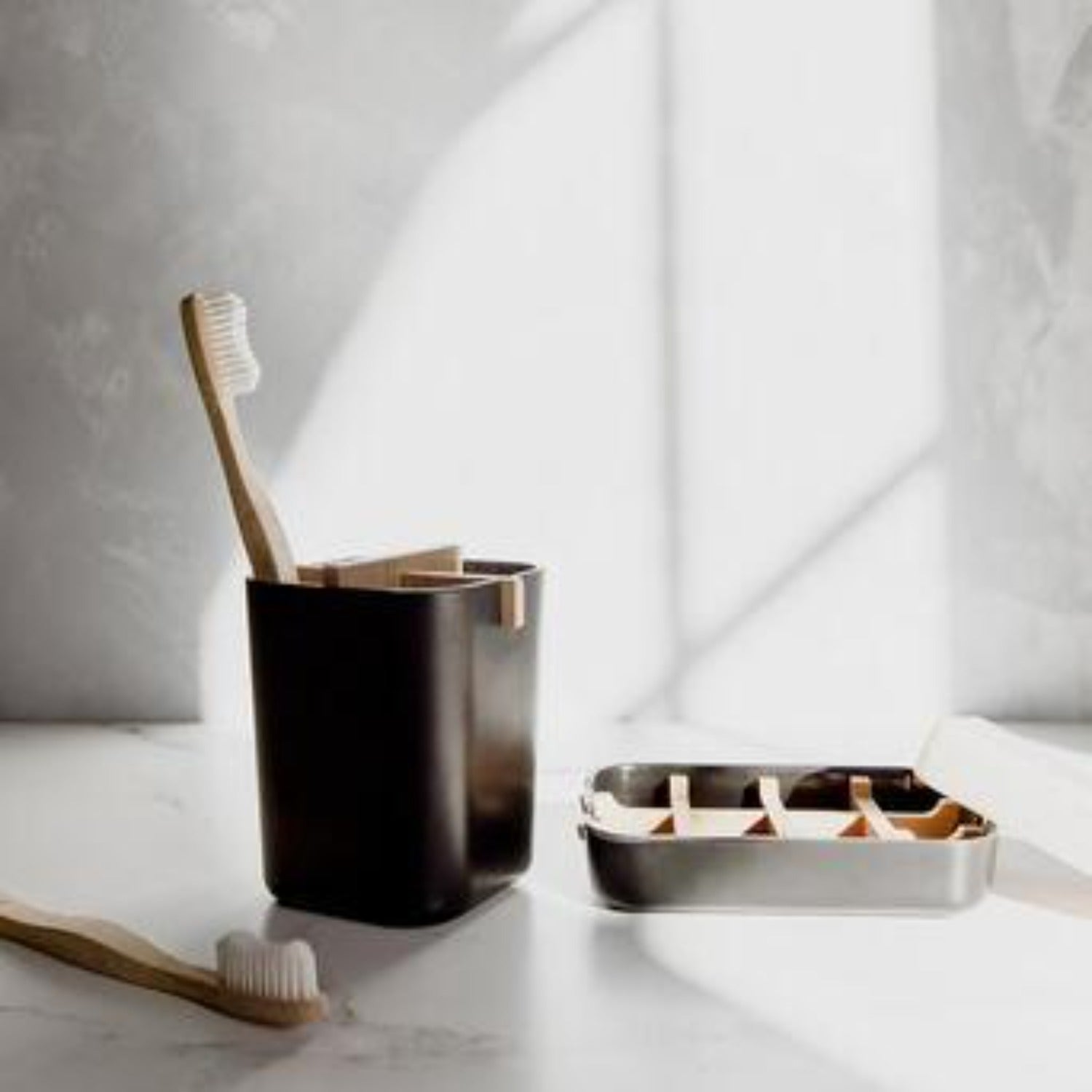 Black Zero Waste Brush Holder and Soap Dish bathroom accessories bundle from ZeroWasteStore.com, eco-friendly and modern design.