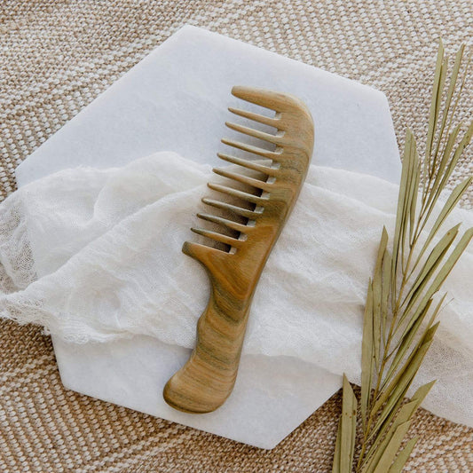 Sandalwood wide tooth comb from ZeroWasteStore.com, 100% wood, plastic-free, natural finish, designed for gentle hair detangling.
