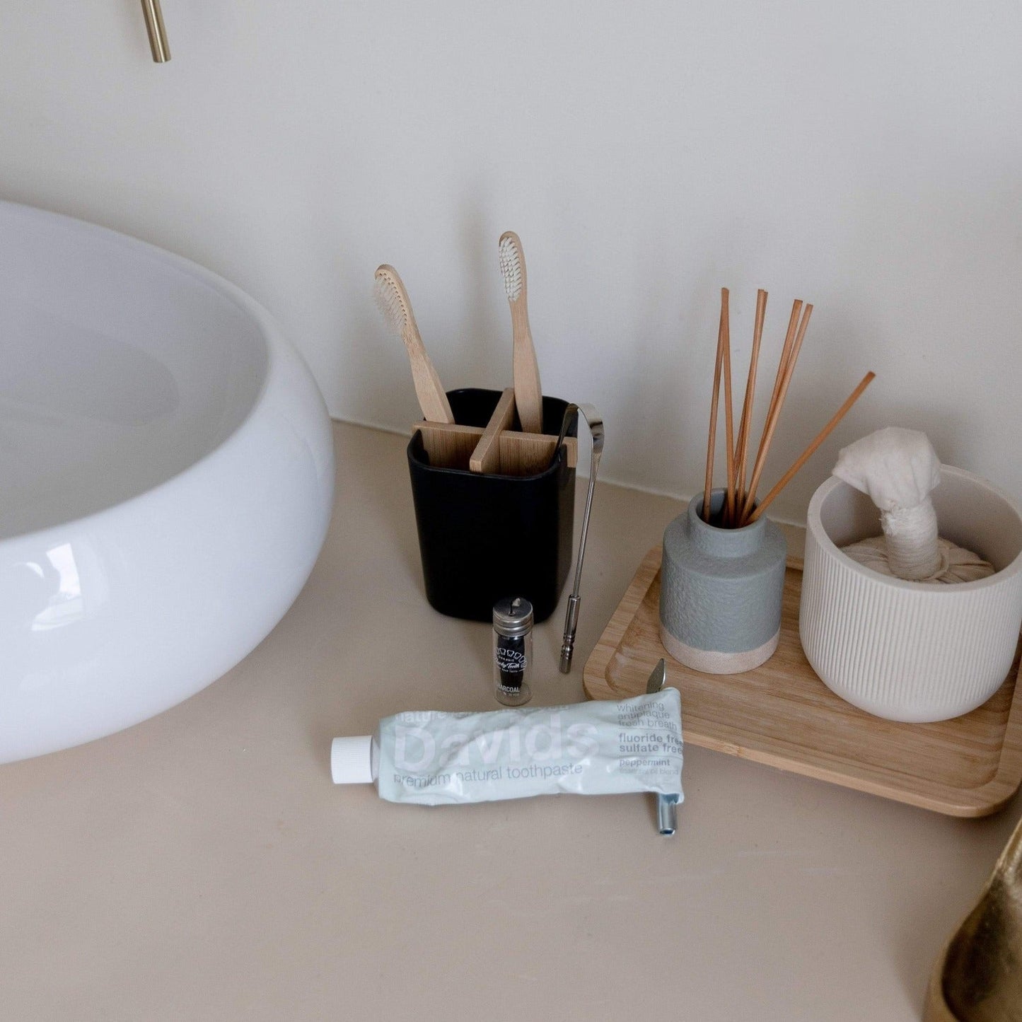 Bamboo charcoal dental floss from ZeroWasteStore.com showing black bamboo charcoal-coated floss for oral cleaning.