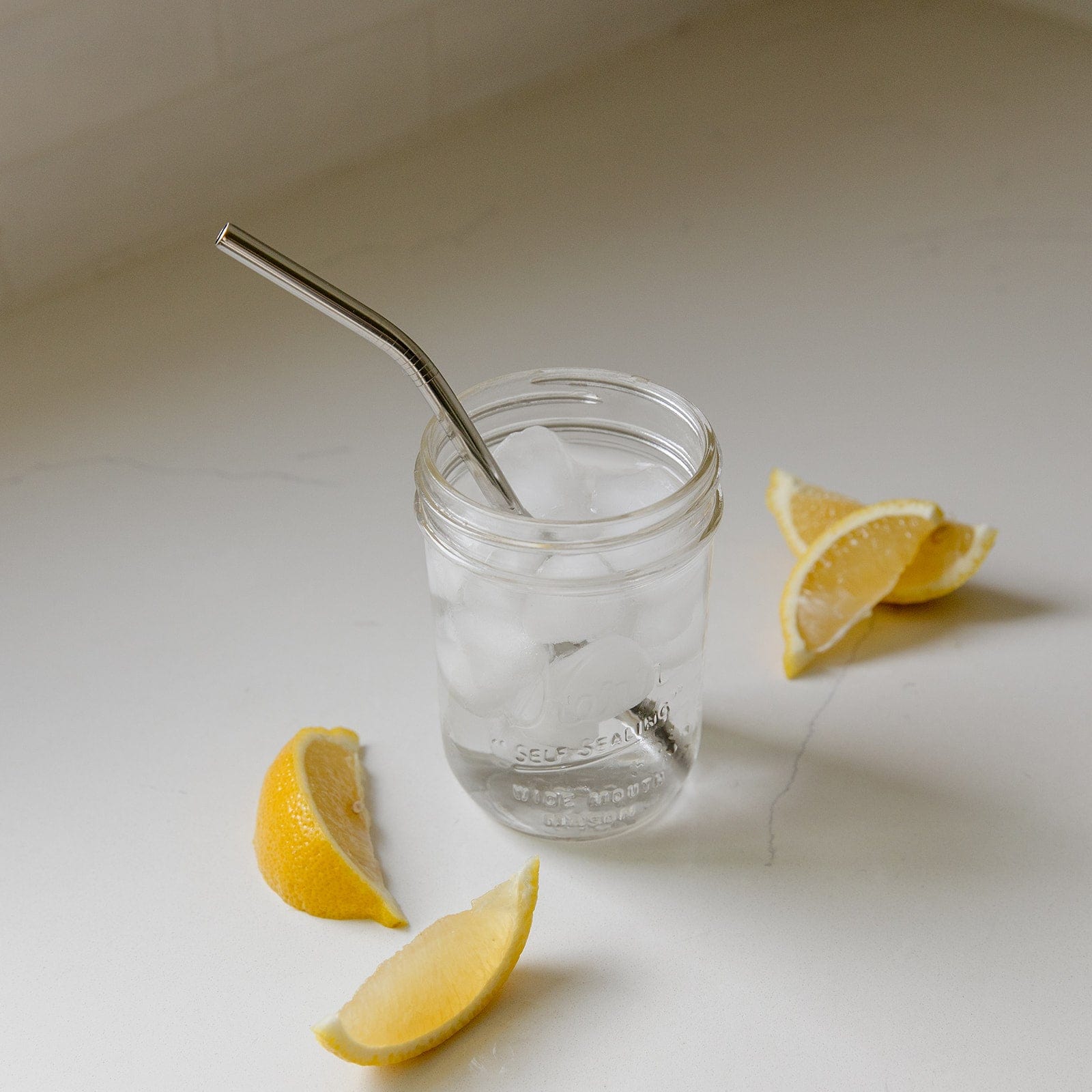 Stainless steel drinking straw in straight, bent, or boba style, designed for reusable eco-friendly beverage use.