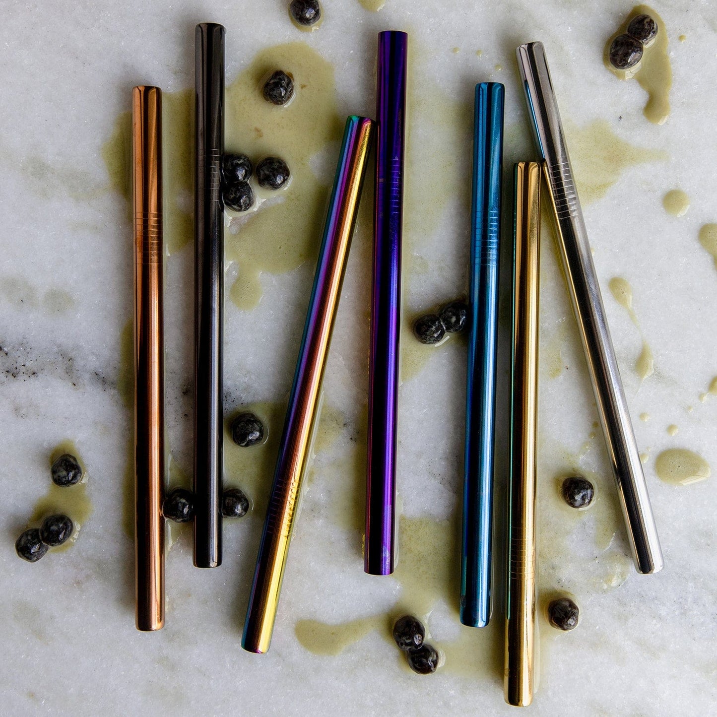 Stainless steel drinking straw in straight, bent, and boba styles, featuring a sleek, reusable design for eco-friendly beverages.