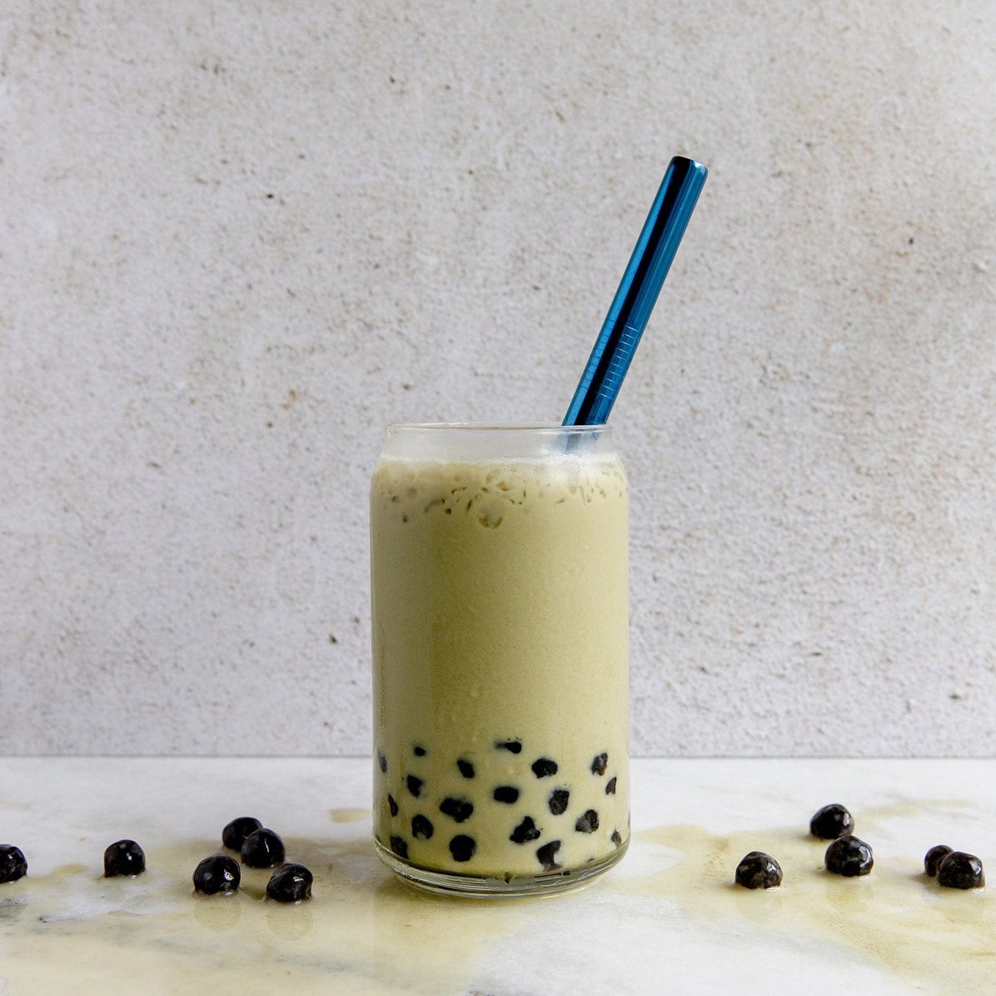 Stainless steel drinking straw available in straight, bent, and boba style, designed for reusable eco-friendly beverage use.