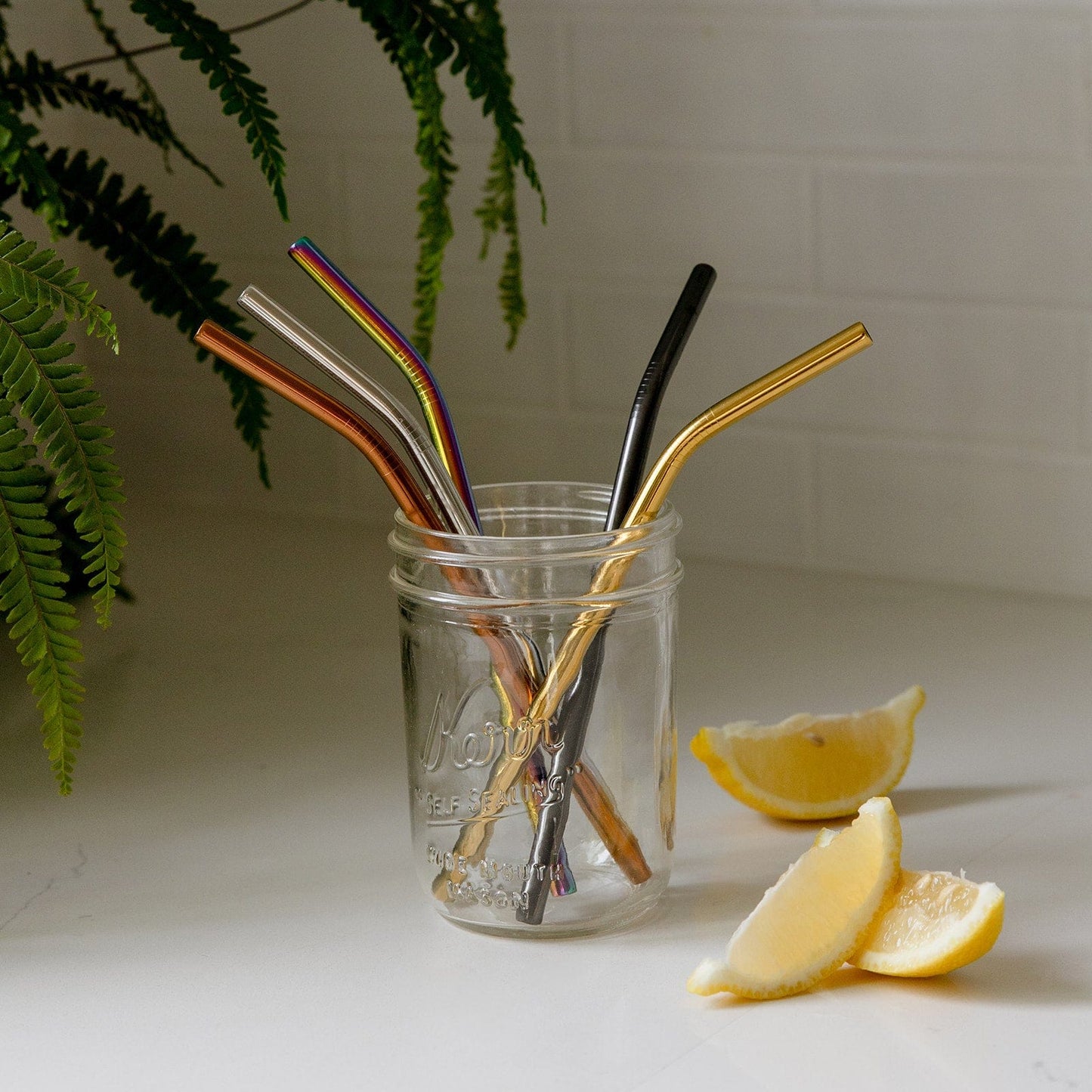 Stainless steel drinking straw in straight, bent, or boba style, perfect for eco-friendly beverages, by ZeroWasteStore.com