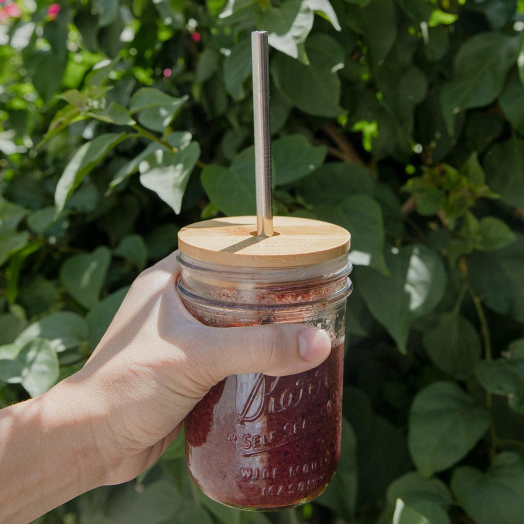 Wide-mouth bamboo mason jar lid for drinkware by ZeroWasteStore.com, showcasing a natural bamboo finish and secure fit.