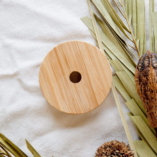 Wide-mouth bamboo mason jar lid for drinkware by ZeroWasteStore.com, made from sustainable bamboo material.