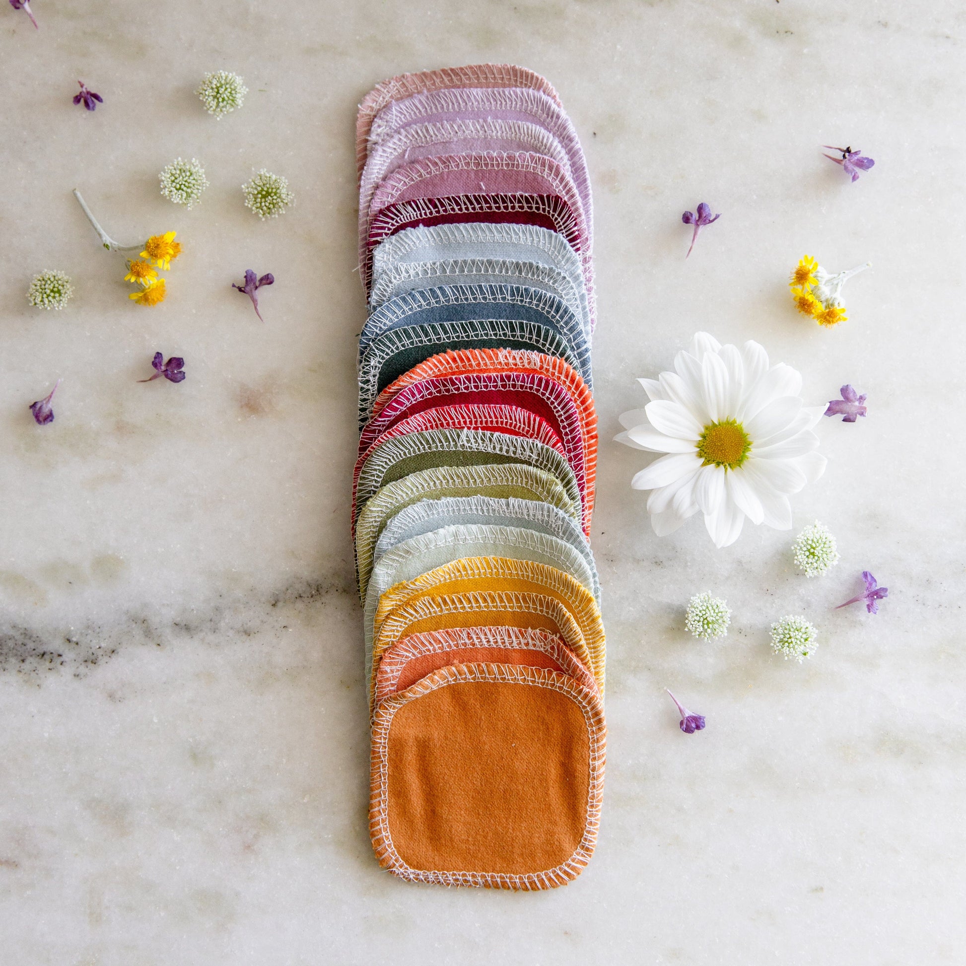 Earth-toned reusable cotton facial rounds from ZeroWasteStore.com, eco-friendly and soft for gentle skincare.