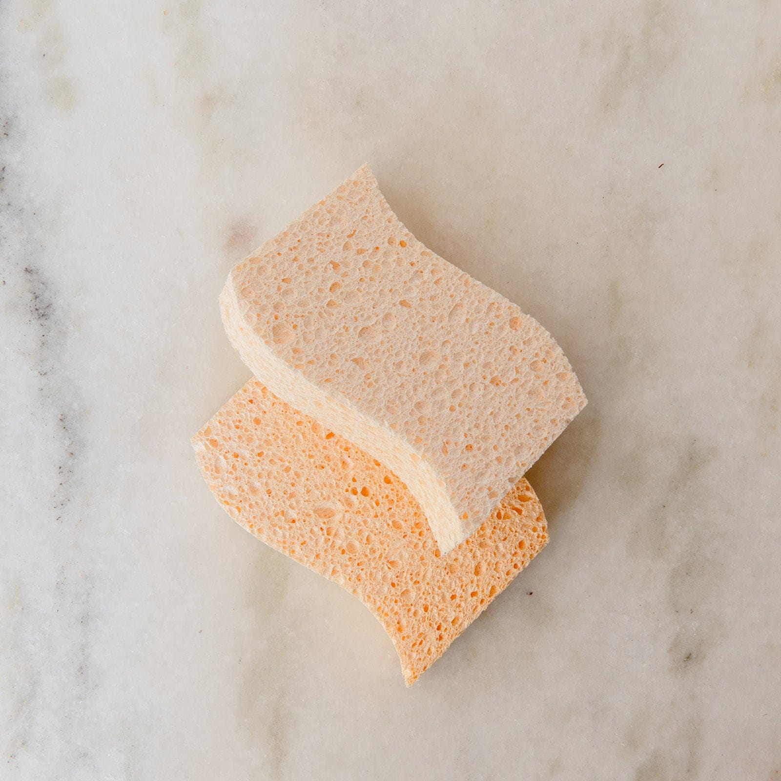 Two cellulose kitchen sponges from ZeroWasteStore.com for household cleaning, shown in a 2-pack.