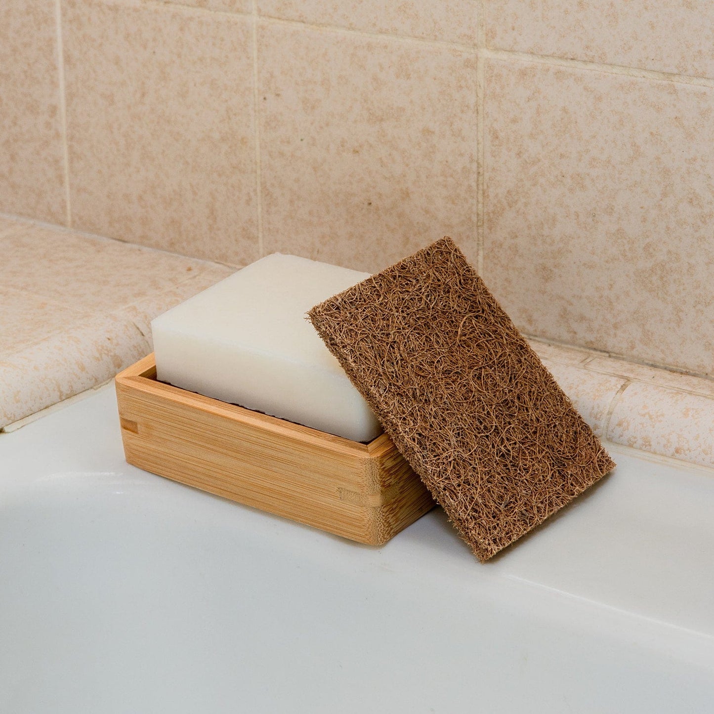 Coconut kitchen scrubber from ZeroWasteStore.com, eco-friendly household cleaning supply for scrubbing dishes and surfaces.