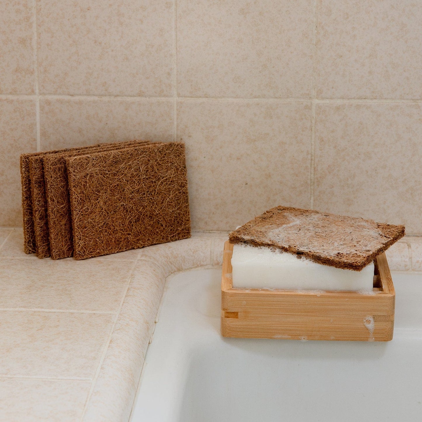 Coconut kitchen scrubber from ZeroWasteStore.com, eco-friendly household cleaning tool with natural fibers for scrubbing dishes.