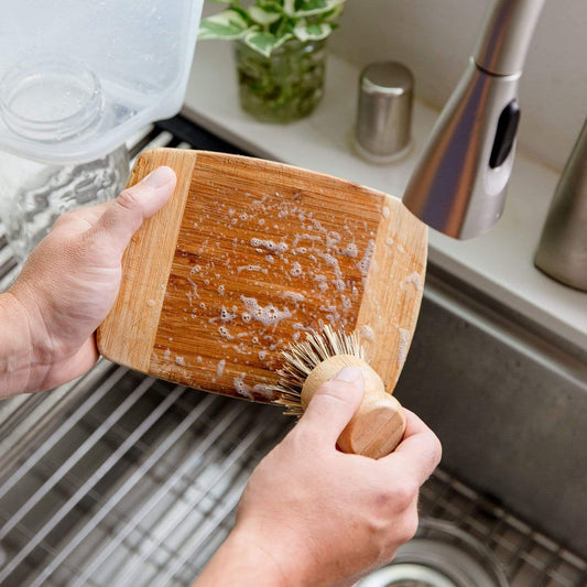 Eco-friendly bamboo pot scrubber, plastic-free and compostable household cleaning brush for eco-conscious kitchen cleaning.