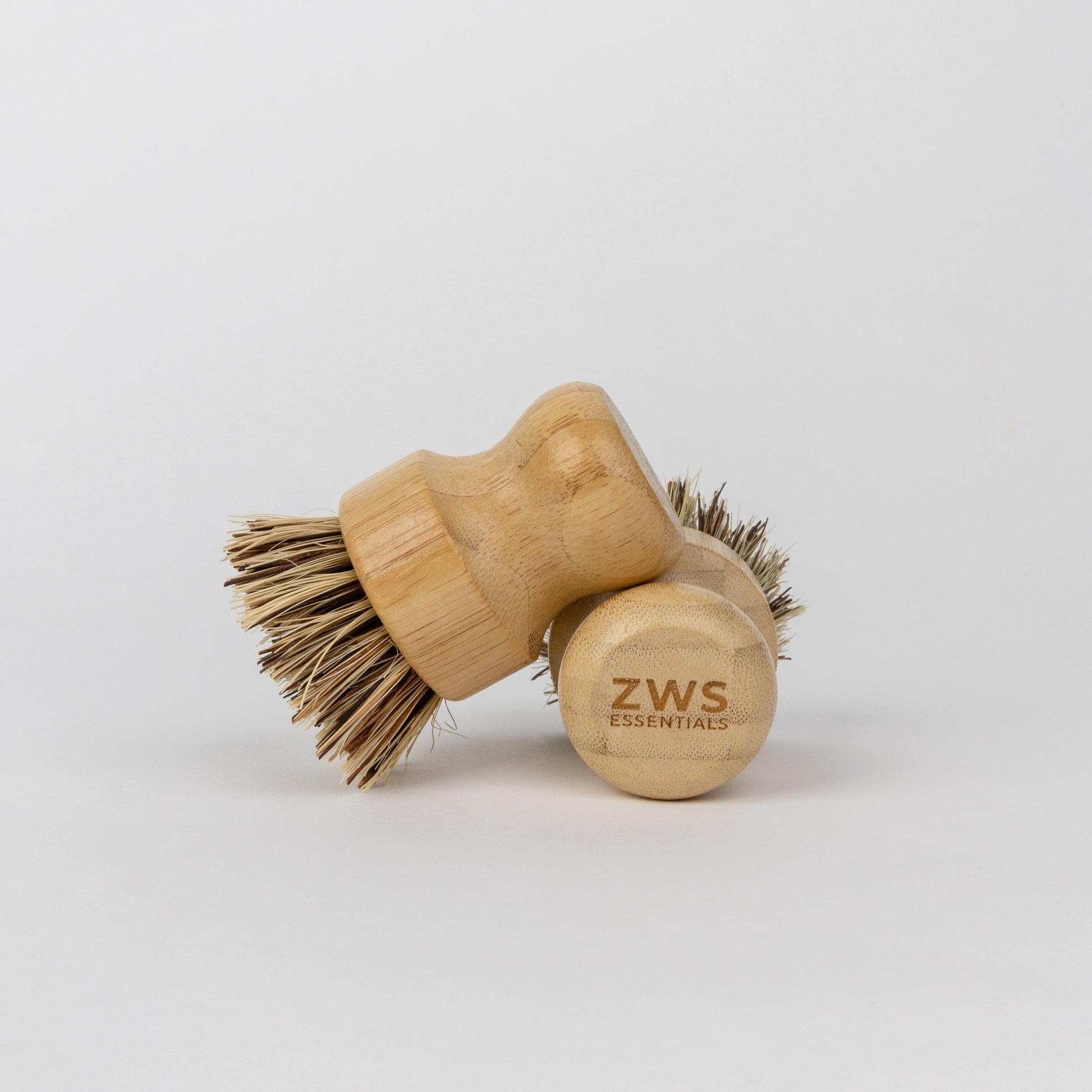 Eco-friendly bamboo pot scrubber from ZeroWasteStore, plastic-free and compostable household cleaning brush for eco-conscious cleaning.
